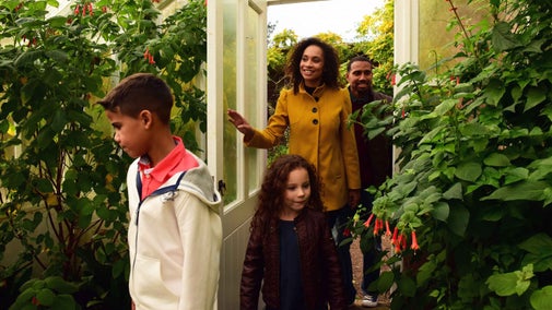 Family walking in Rowallane Garden, County Down in November